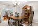 Formal dining room with ornate wood furniture and bright decor at 6919 S Valentia St, Centennial, CO 80112