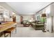 Bright living room with large window, traditional furnishings and neutral color scheme at 6919 S Valentia St, Centennial, CO 80112
