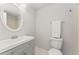 Bright bathroom featuring a modern vanity and mirror at 1160 S Monaco Pkwy # 6, Denver, CO 80224