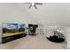 Upstairs bonus room featuring a desk and entertainment area at 1160 S Monaco Pkwy # 6, Denver, CO 80224