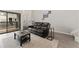 Open-concept living room with comfortable seating and access to outdoor space at 1160 S Monaco Pkwy # 6, Denver, CO 80224