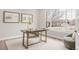 Cozy home office with a workspace, natural light, and calming decor for productivity at 14850 Akron St, Brighton, CO 80602