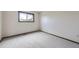 Bright bedroom with carpet and a window providing lots of natural light at 10020 Bryant St, Denver, CO 80260