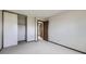 Bedroom with ample space and neutral decor and a closet for storage at 10020 Bryant St, Denver, CO 80260