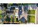 This aerial shot captures the home's layout, roof, yard, and outdoor living spaces at 2612 Meadowbrook Dr, Denver, CO 80221