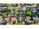 An aerial view of the neighborhood, showcasing lush trees and well-maintained homes in a peaceful community at 2612 Meadowbrook Dr, Denver, CO 80221