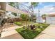 Charming backyard with patio, fire pit, storage shed, and ample space for outdoor activities at 2612 Meadowbrook Dr, Denver, CO 80221