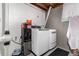 Functional laundry area with modern washer and dryer at 2612 Meadowbrook Dr, Denver, CO 80221