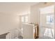 Spacious landing featuring a built in bar, carpet flooring and bright light at 1145 S Boston St, Denver, CO 80247