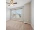 Bedroom with neutral carpet and ample natural light from large windows at 2230 Valentia St, Denver, CO 80238