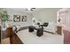 Spacious living room featuring modern decor and hardwood floors, perfect for entertaining at 2230 Valentia St, Denver, CO 80238