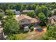 An aerial view of the backyard and surrounding neighborhood on a sunny day at 6411 W 82Nd Dr, Arvada, CO 80003