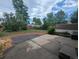 Backyard featuring a patio, lawn, trees and shrubs at 6411 W 82Nd Dr, Arvada, CO 80003
