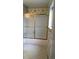 Bathroom shower features gold frame, glass doors and floral wallpaper at 6411 W 82Nd Dr, Arvada, CO 80003