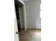 Bedroom with gray walls, carpet, closet with built-in organizer and a window at 6411 W 82Nd Dr, Arvada, CO 80003
