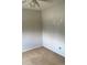 Bedroom with gray walls, carpet, plain ceiling and a wall outlet at 6411 W 82Nd Dr, Arvada, CO 80003