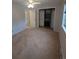 Bedroom with gray walls, carpet, ceiling fan, closet and a window at 6411 W 82Nd Dr, Arvada, CO 80003