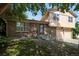 Charming home with brick and siding exterior, featuring a well-manicured front yard at 6411 W 82Nd Dr, Arvada, CO 80003