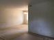 Spacious living room with ample natural light and a seamless flow to the dining area at 6411 W 82Nd Dr, Arvada, CO 80003