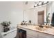 Well-lit bathroom features a marble countertop, vanity, and decorative accents at 5255 S Waco St, Centennial, CO 80015