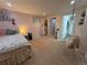 Cozy bedroom with a hanging chair, adjacent bathroom, and charming decor for a relaxing, personal space at 5255 S Waco St, Centennial, CO 80015
