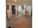 Bedroom with a swinging chair, closet, bathroom and neutral carpet at 5255 S Waco St, Centennial, CO 80015