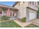 Inviting home entrance featuring manicured lawn and charming curb appeal at 5255 S Waco St, Centennial, CO 80015