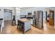 Well-equipped kitchen with stainless steel appliances and functional island at 5255 S Waco St, Centennial, CO 80015