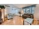 Bright living room featuring hardwood floors and cozy seating arrangement at 5255 S Waco St, Centennial, CO 80015