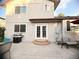 Back patio with outdoor seating, grill, and easy access to indoor living at 5255 S Waco St, Centennial, CO 80015
