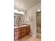 Clean bathroom with double sinks and a separate tub and shower at 14307 Waterside Ln, Broomfield, CO 80023