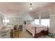 Charming bedroom with a queen bed and decorative wall hanging at 14307 Waterside Ln, Broomfield, CO 80023