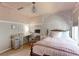 Cozy bedroom with a built-in desk and decorative wall hanging at 14307 Waterside Ln, Broomfield, CO 80023