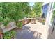 Outdoor kitchen and dining area on a large deck at 14307 Waterside Ln, Broomfield, CO 80023