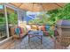 Spacious deck with comfortable seating, a fire pit, and ample shade at 14307 Waterside Ln, Broomfield, CO 80023