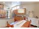 Elegant dining area with hardwood floors and a farmhouse style table and chairs at 14307 Waterside Ln, Broomfield, CO 80023