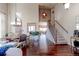 Formal dining room with hardwood floors, chandelier, and antique furniture at 14307 Waterside Ln, Broomfield, CO 80023