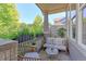 Cozy front porch with seating area, planters, and room divider at 14307 Waterside Ln, Broomfield, CO 80023