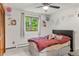 bedroom with whimsical decor and a window view to the backyard at 8571 W 71St Cir, Arvada, CO 80004