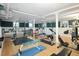 Spacious basement gym featuring wood floors, weight equipment, and ample workout space at 836 E 17Th Ave # 2B, Denver, CO 80218