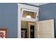 Charming interior doorway featuring a transom window and white trim, adding architectural interest to the space at 836 E 17Th Ave # 2B, Denver, CO 80218
