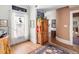 Hallway and entryway with hardwood floors and curved wall feature at 836 E 17Th Ave # 2B, Denver, CO 80218