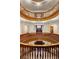 The grand foyer showcases ornate woodwork and multiple levels at 836 E 17Th Ave # 2B, Denver, CO 80218