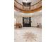 Grand foyer features intricate tile mosaic, with an elegant metal gate and woodwork at 836 E 17Th Ave # 2B, Denver, CO 80218