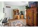 Home office includes hardwood floors, desk, hutch and decorative cabinet at 836 E 17Th Ave # 2B, Denver, CO 80218
