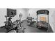 Home gym in basement, features treadmill and workout equipment at 1470 S Yates St, Denver, CO 80219