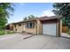Inviting single-Gathering home with attached garage and a wide driveway at 1470 S Yates St, Denver, CO 80219