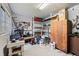 Spacious storage room or workshop with ample shelving and a workbench at 1470 S Yates St, Denver, CO 80219
