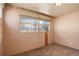 Bedroom with large windows offering plenty of natural light at 41 Cortez St, Denver, CO 80221