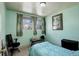 Bedroom with large windows offering plenty of natural light at 41 Cortez St, Denver, CO 80221